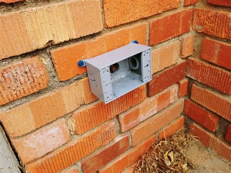 cutting brick for electrical box|exterior outlet for brick house.